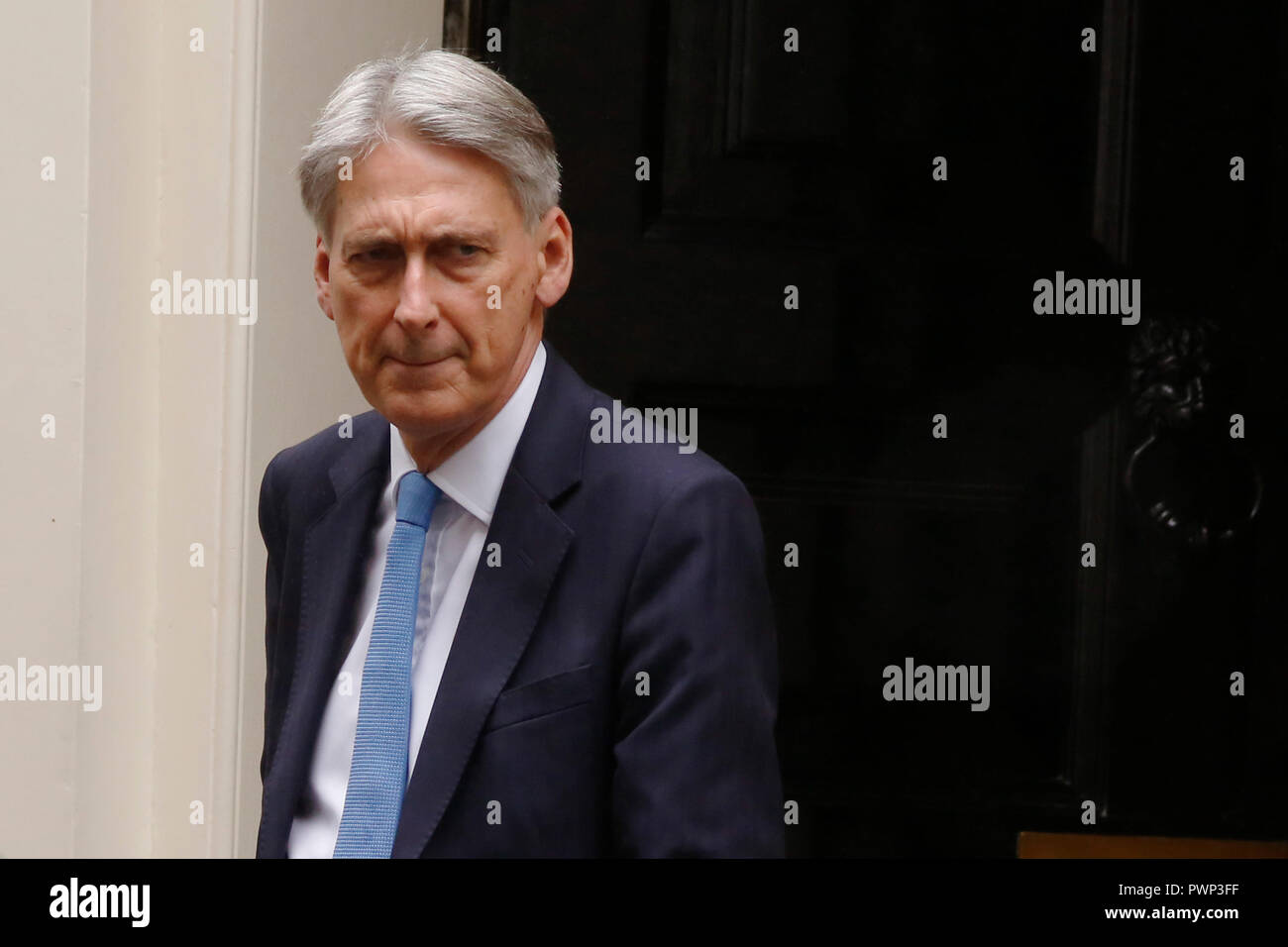 London, UK. 17th Oct, 2018. Britain's Chancellor of the Exchequer Philip Hammond leaves, Downing Street ahead of Prime Ministers Questions in London, Wednesday October 17, 2018. Credit: Luke MacGregor/Alamy Live News Stock Photo