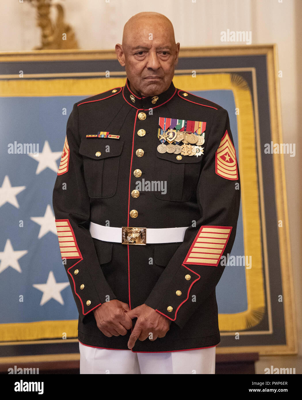 Washington, District of Columbia, USA. 17th Oct, 2018. Sergeant Major John L. Canley, United States Marine Corps (Retired) listens as US President Donald J. Trump makes remarks where he will be awarded him the Medal of Honor for conspicuous gallantry during the Vietnam War in a ceremony in the East Room of the the White House in Washington, DC on Wednesday, October 17, 2018 Credit: Ron Sachs/CNP/ZUMA Wire/Alamy Live News Stock Photo