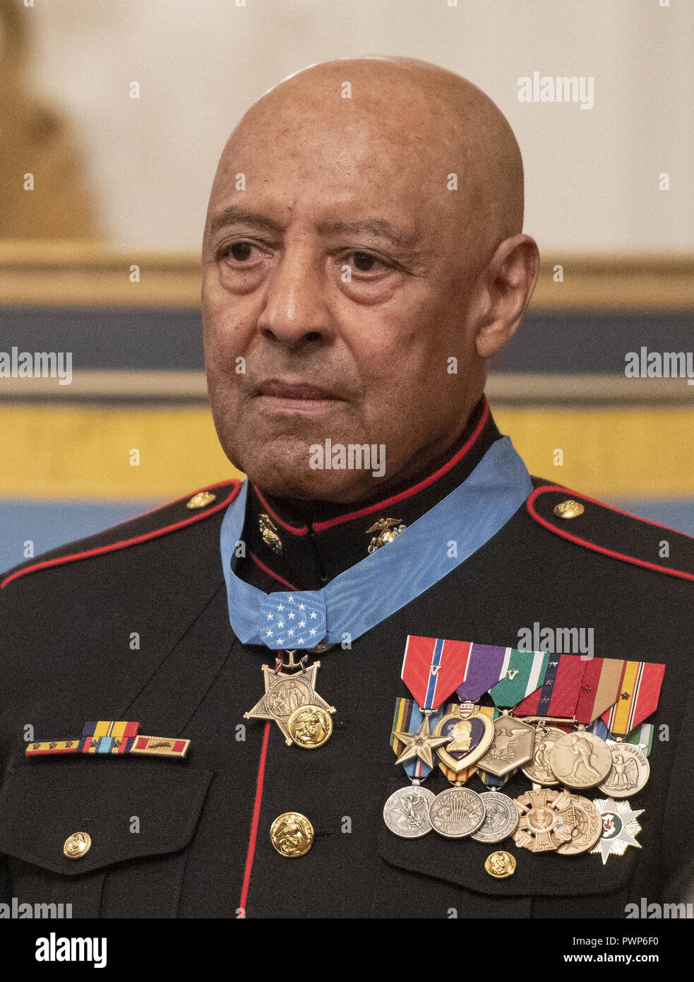 Washington, District of Columbia, USA. 17th Oct, 2018. Sergeant Major John L. Canley, United States Marine Corps (Retired) wears his medal at the conclusion of the ceremony where US President Donald J. Trump awarded him the Medal of Honor for conspicuous gallantry during the Vietnam War in a ceremony in the East Room of the the White House in Washington, DC on Wednesday, October 17, 2018 Credit: Ron Sachs/CNP/ZUMA Wire/Alamy Live News Stock Photo