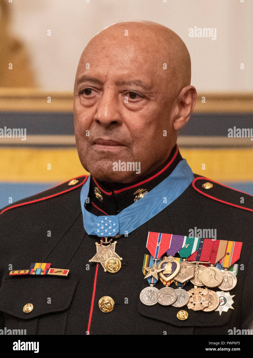 Washington, USA. 17th Oct 2018. Sergeant Major John L. Canley, United States Marine Corps (Retired) wears his medal at the conclusion of the ceremony where US President Donald J. Trump awarded him the Medal of Honor for conspicuous gallantry during the Vietnam War in a ceremony in the East Room of the the White House in Washington, DC on Wednesday, October 17, 2018. Credit: Ron Sachs/CNP/MediaPunch Credit: MediaPunch Inc/Alamy Live News Stock Photo