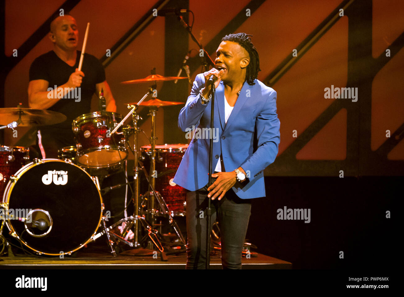 Nashville, Tennessee, USA. 16th Oct, 2018. Newsboys United performing at the 49th GMA Dove Awards were held at Lipscomb University's Allen Arena in Nashville. Michael Tait and longtime members Duncan Phillips, Jeff Frankenstein and Jody Davis united with former drummer/lead vocalist Peter Furler and bassist Phil Joel. Credit: Jason Walle/ZUMA Wire/Alamy Live News Stock Photo