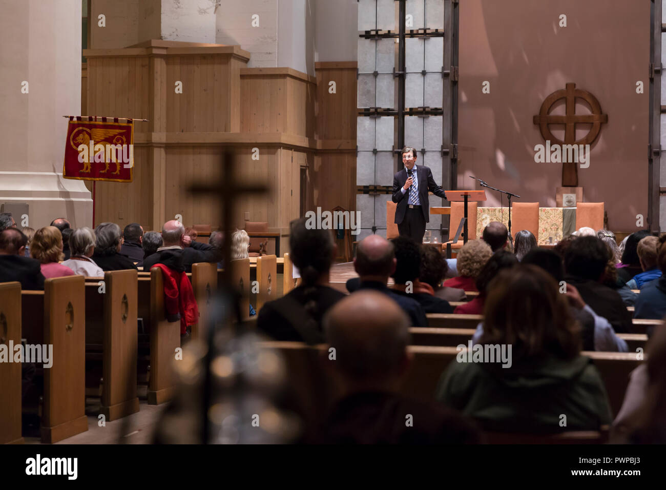 Seattle, Washington DC, USA. 17th Oct 2018. Attorney General Bob Ferguson speaks to supporters at St. Mark's Episcopal Cathedral during a discussion on the current state immigration. “Immigration Reform in Washington State” was hosted by St. Mark's Episcopal Cathedral and included a panel with representatives from Casa Latina, El Centro de la Raza and the Church Council of Greater Seattle. Credit: Paul Christian Gordon/Alamy Live News Stock Photo