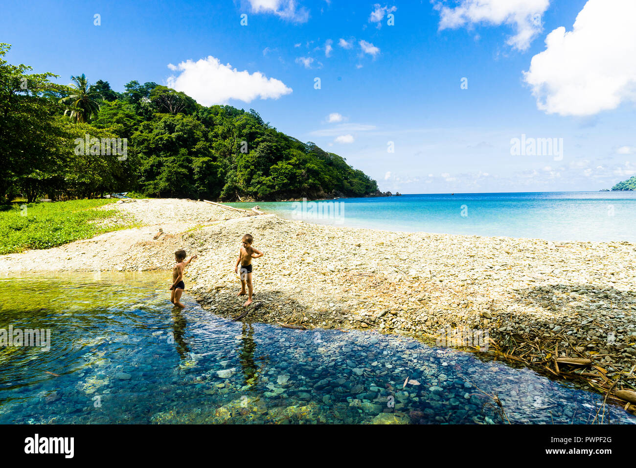 Two boys playing river hi-res stock photography and images - Alamy