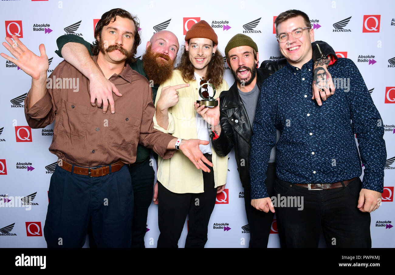 Joe Talbot, Adam Devonshire, Mark Bowen, Lee Kiernan and Jon Beavis of Idles winners of the Q Breakthrough Award in the press room during the Q Awards 2018 in association with Absolute Radio at the Camden Roundhouse, London. Stock Photo