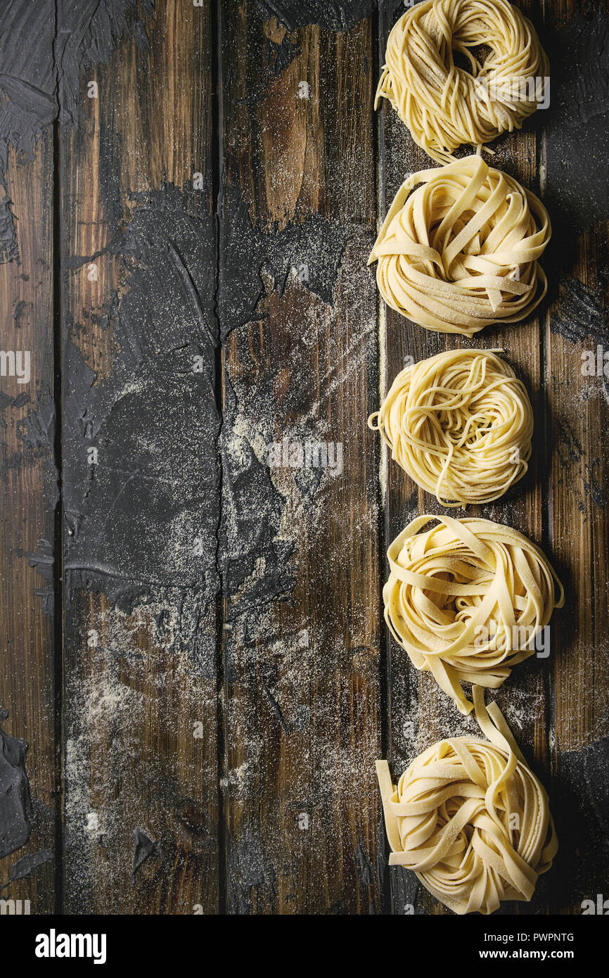 Variety of italian homemade raw uncooked pasta spaghetti and ...