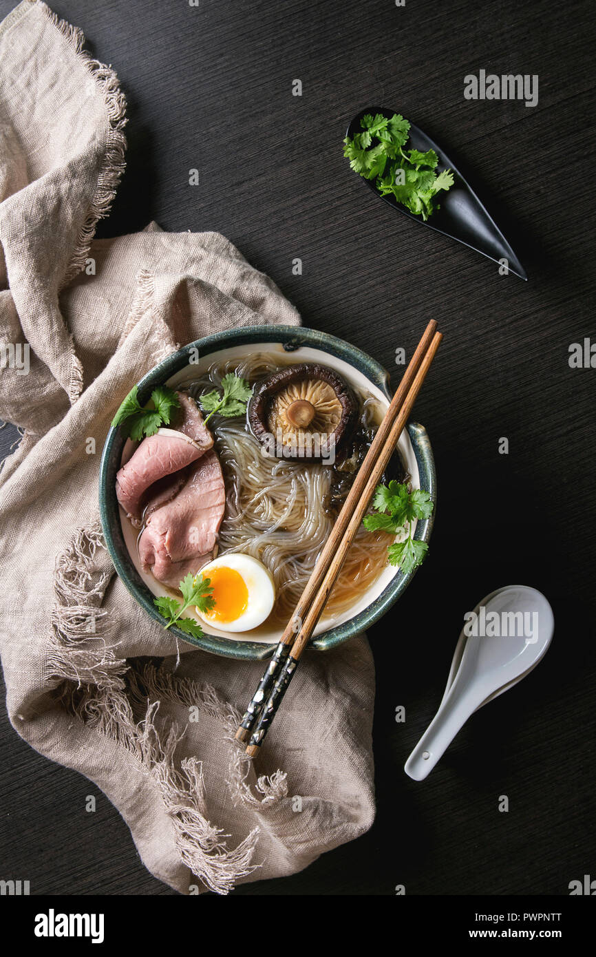 Traditional Japanese Noodle Soup with shiitake mushroom, egg, sliced