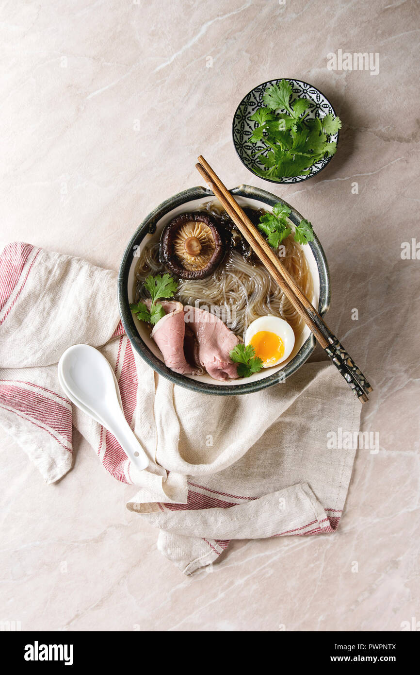 Traditional Japanese Noodle Soup with shiitake mushroom, egg, sliced