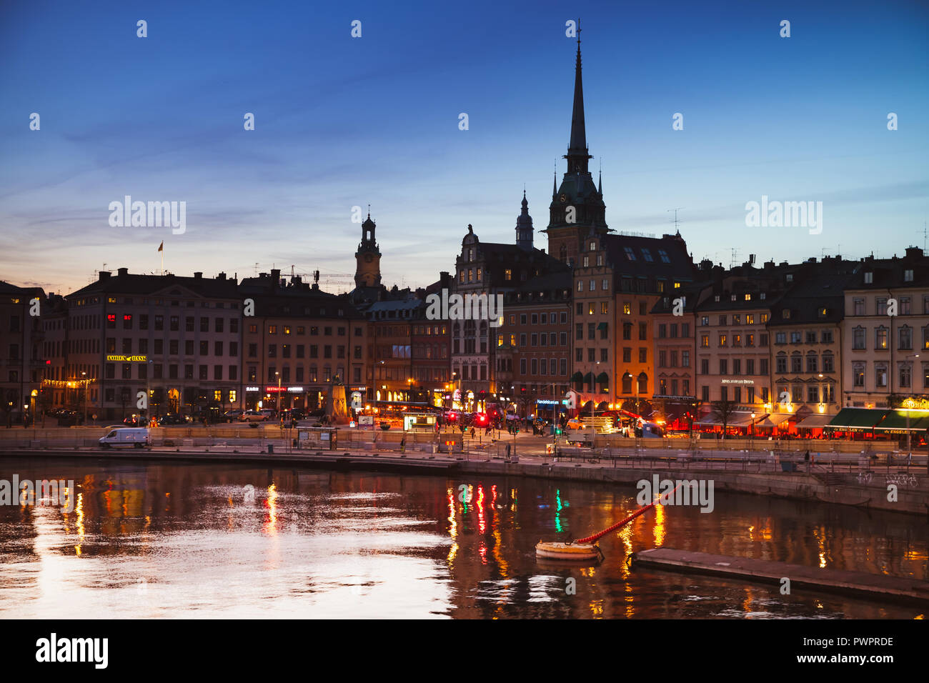 Stockholm, Sweden - May 4, 2016: Silhouette cityscape of Gamla Stan city district, central Stockholm with German Church spire over night sky Stock Photo