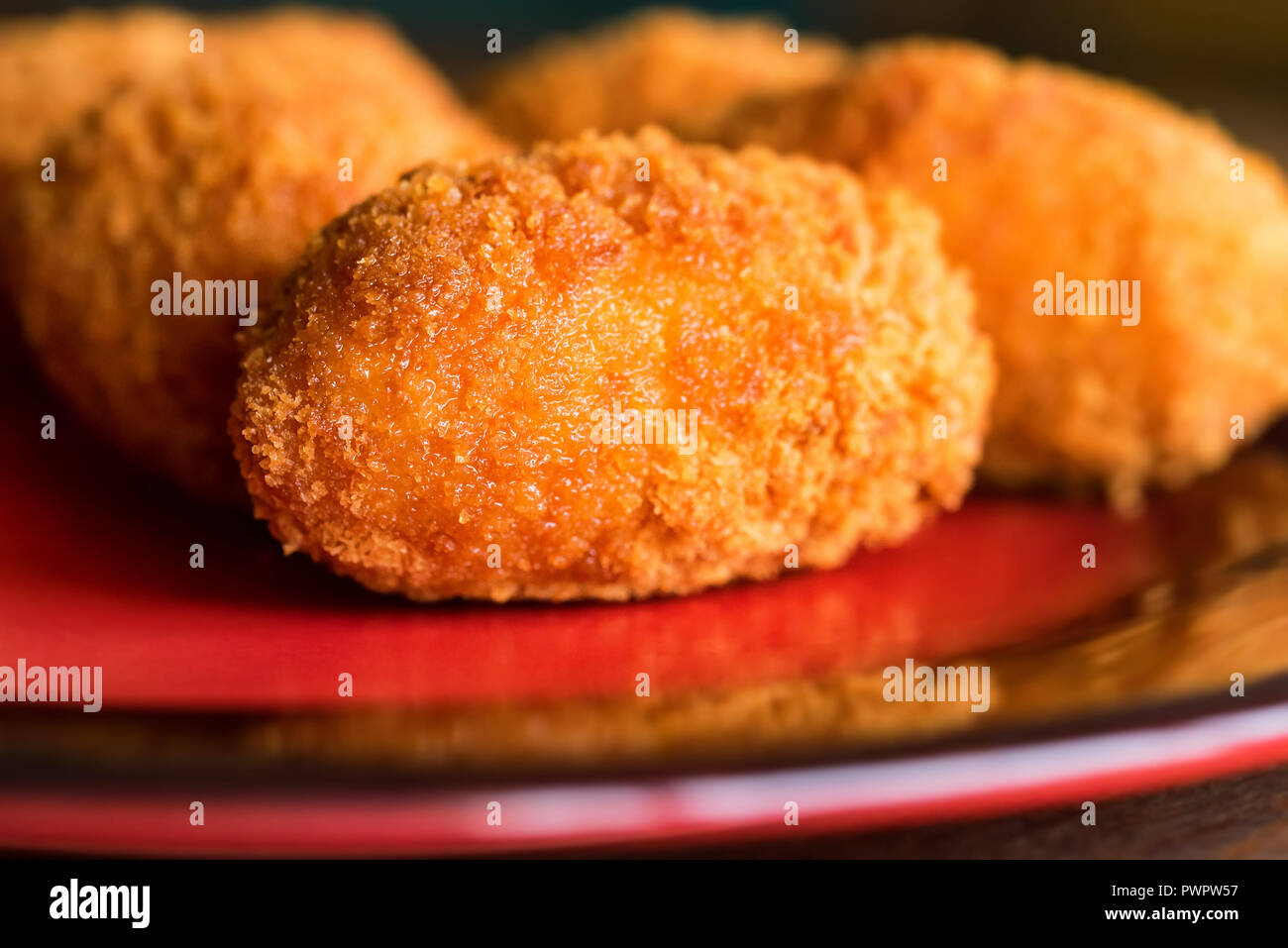 Freshly cooked breaded meat cutlets on plate Stock Photo