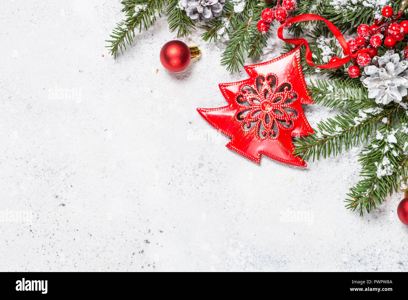Christmas background with fir tree and decorations on white back Stock ...