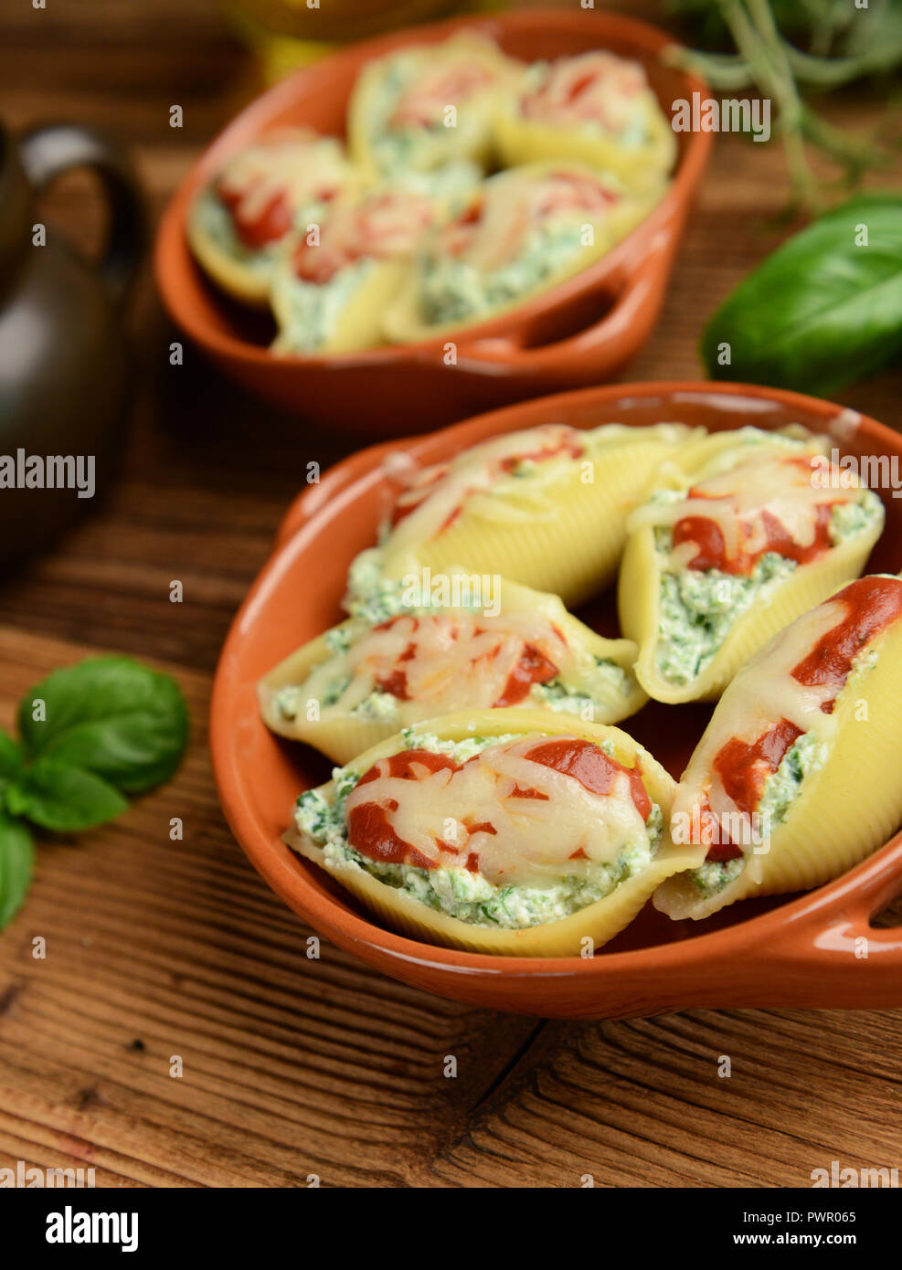 Pasta shells stuffed with ricotta cheese and spinach Stock Photo