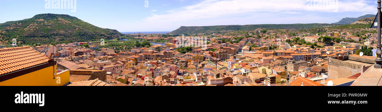 Bosa, Sardinia / Italy - 2018/08/13: Panoramic view of the historic town of Bosa at the western coast of Sardegna by the Fiume Temo river and Bosa Mar Stock Photo