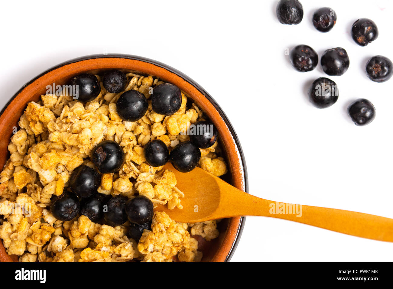 Breakfast cereals with berry fruit in a bowl top view Stock Photo