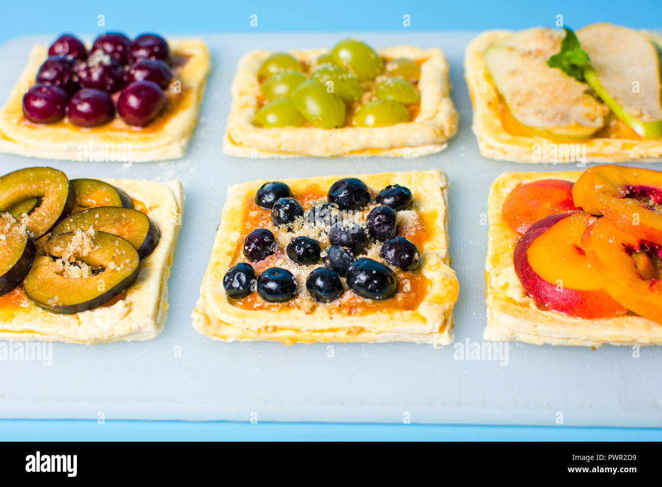 Home made fruit sweet pies before baking Stock Photo