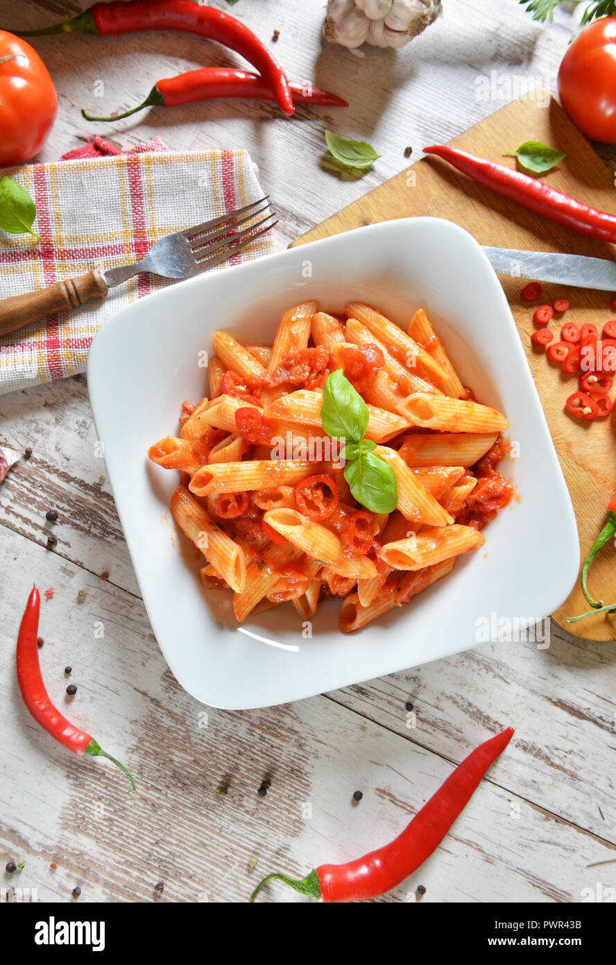 Penne pasta with chili sauce arrabiata Stock Photo - Alamy