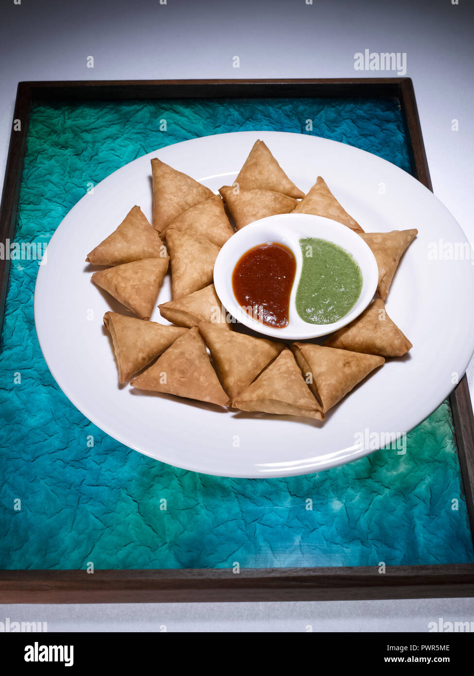 COCKTAIL SAMOSA WITH DATE CHUTNEY AND CORIANDER CHUTNEY Stock Photo Alamy