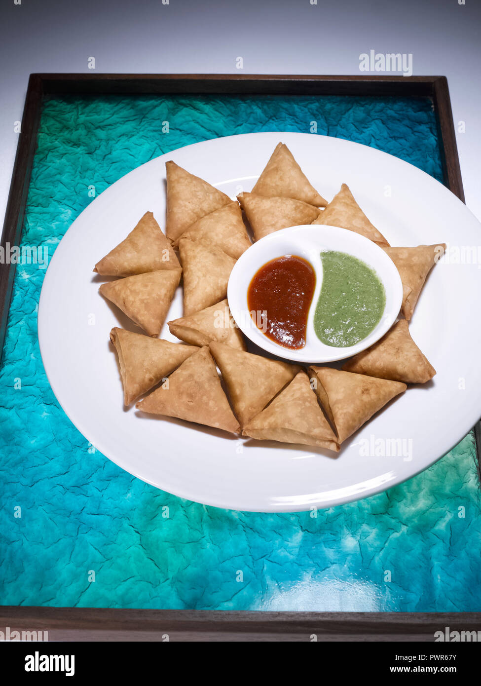COCKTAIL SAMOSA WITH DATE CHUTNEY AND CORIANDER CHUTNEY Stock Photo Alamy