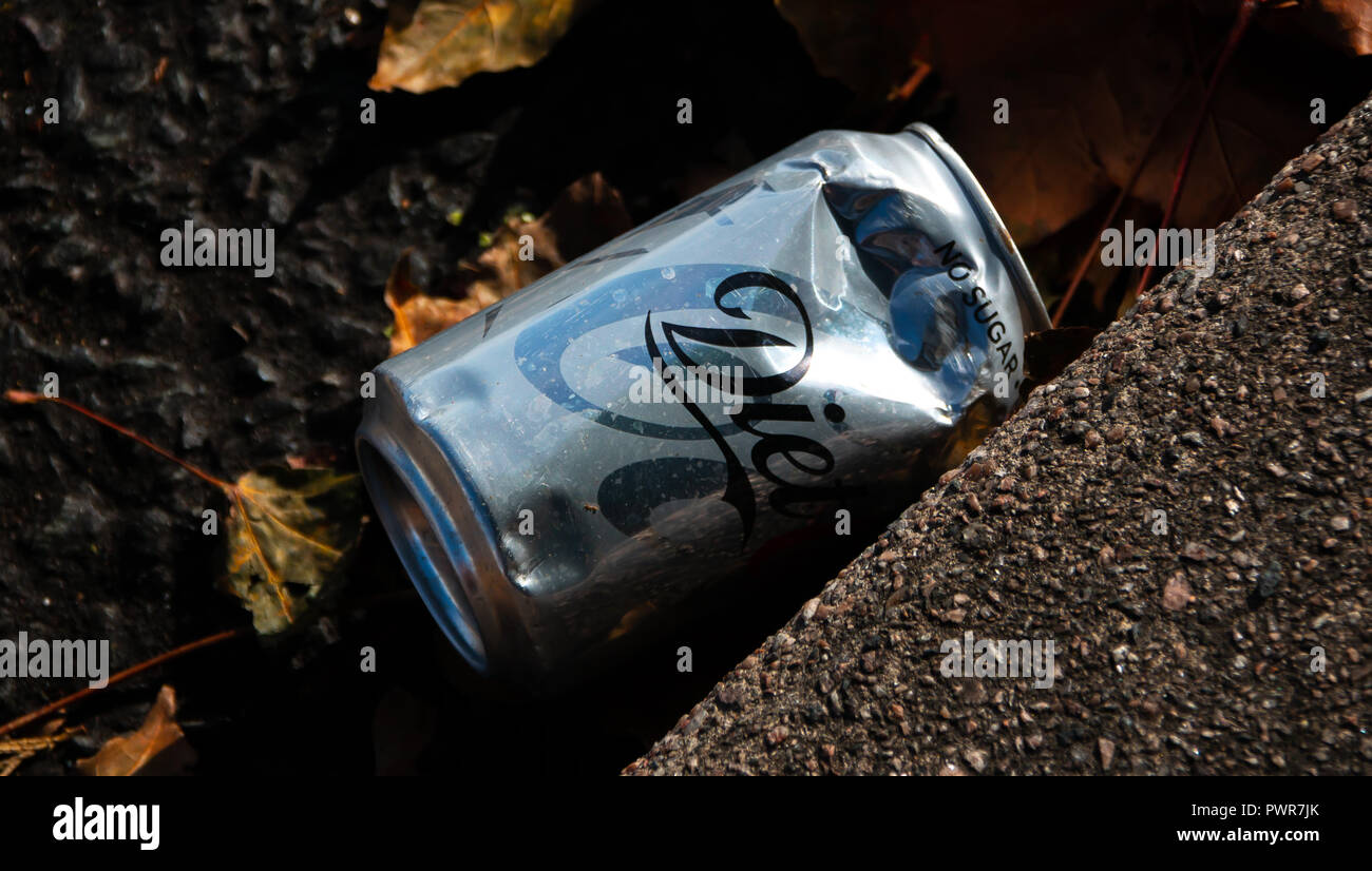 A littered can of Diet Coke in a gutter Stock Photo