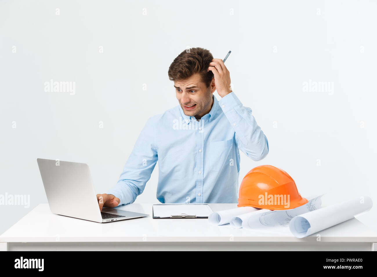 Young workman annoyed angry in furious gesture. Negative expression on ...