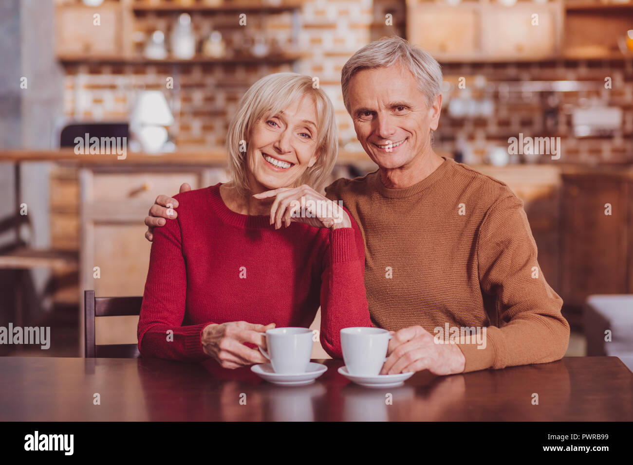Happy spouses having lunch together Stock Photo
