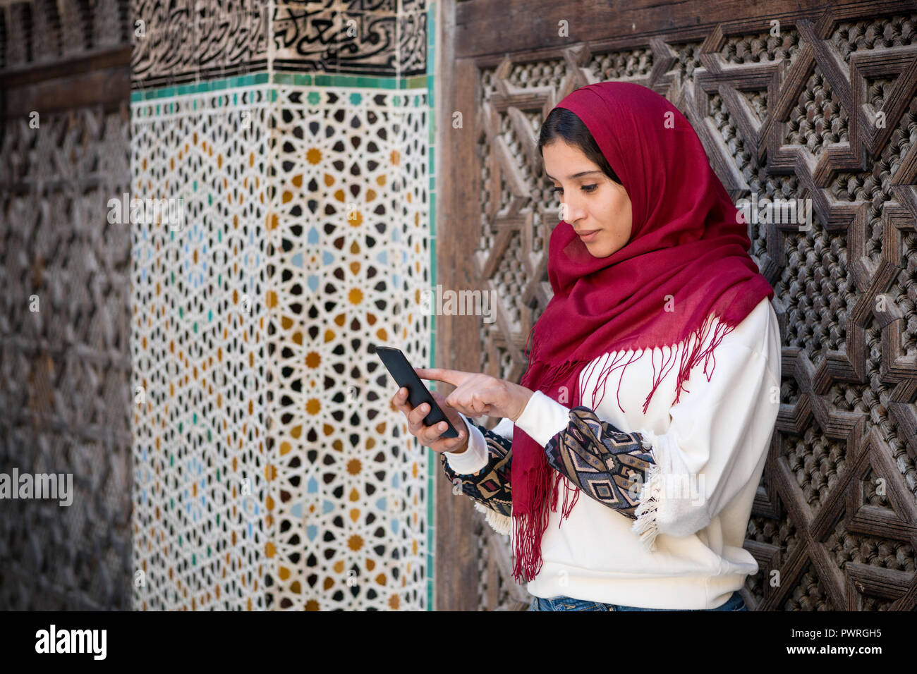 Attractive muslim woman using hi-res stock photography and images - Alamy