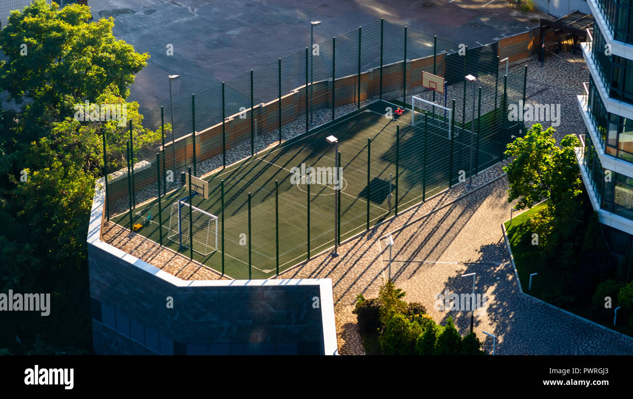 basketball court with nets and fences Stock Photo Alamy