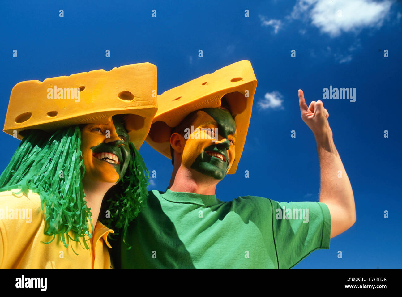 https://c8.alamy.com/comp/PWRH3R/enthusiastic-cheesehead-sports-fans-with-painted-faces-at-a-football-game-usa-PWRH3R.jpg