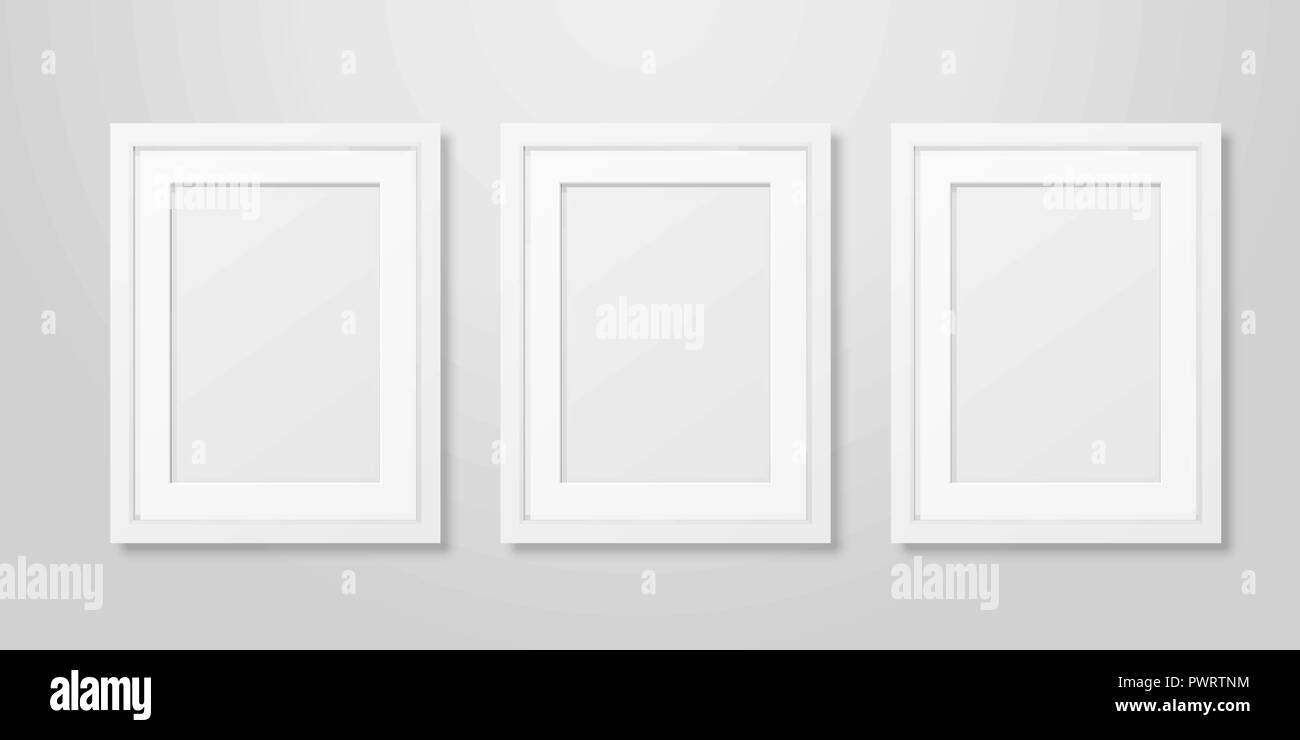 https://c8.alamy.com/comp/PWRTNM/three-vector-realistic-mofern-interior-white-blank-vertical-a4-wooden-poster-picture-frame-set-closeup-on-white-wall-mock-up-empty-poster-frames-design-template-for-mockup-presentation-PWRTNM.jpg