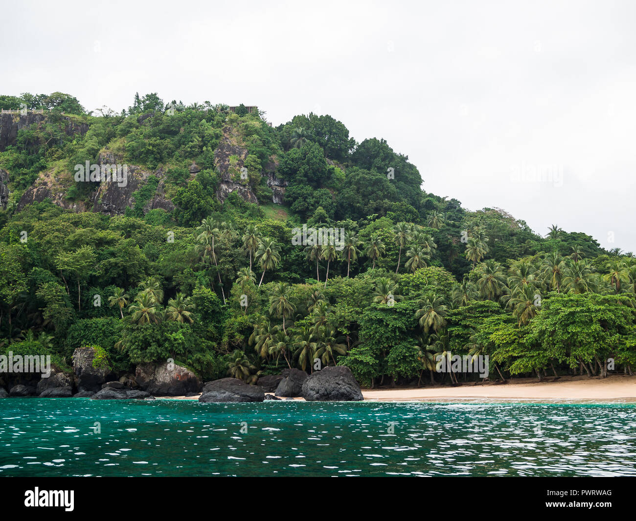Tropical forest and white sand beach off Principe Island Stock Photo