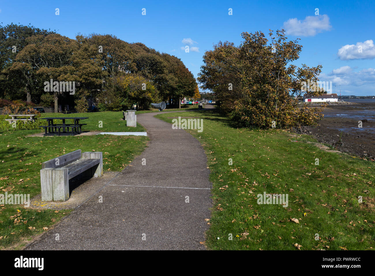 Seafront path with picnic tables in Dundrum, County Down, N.Ireland