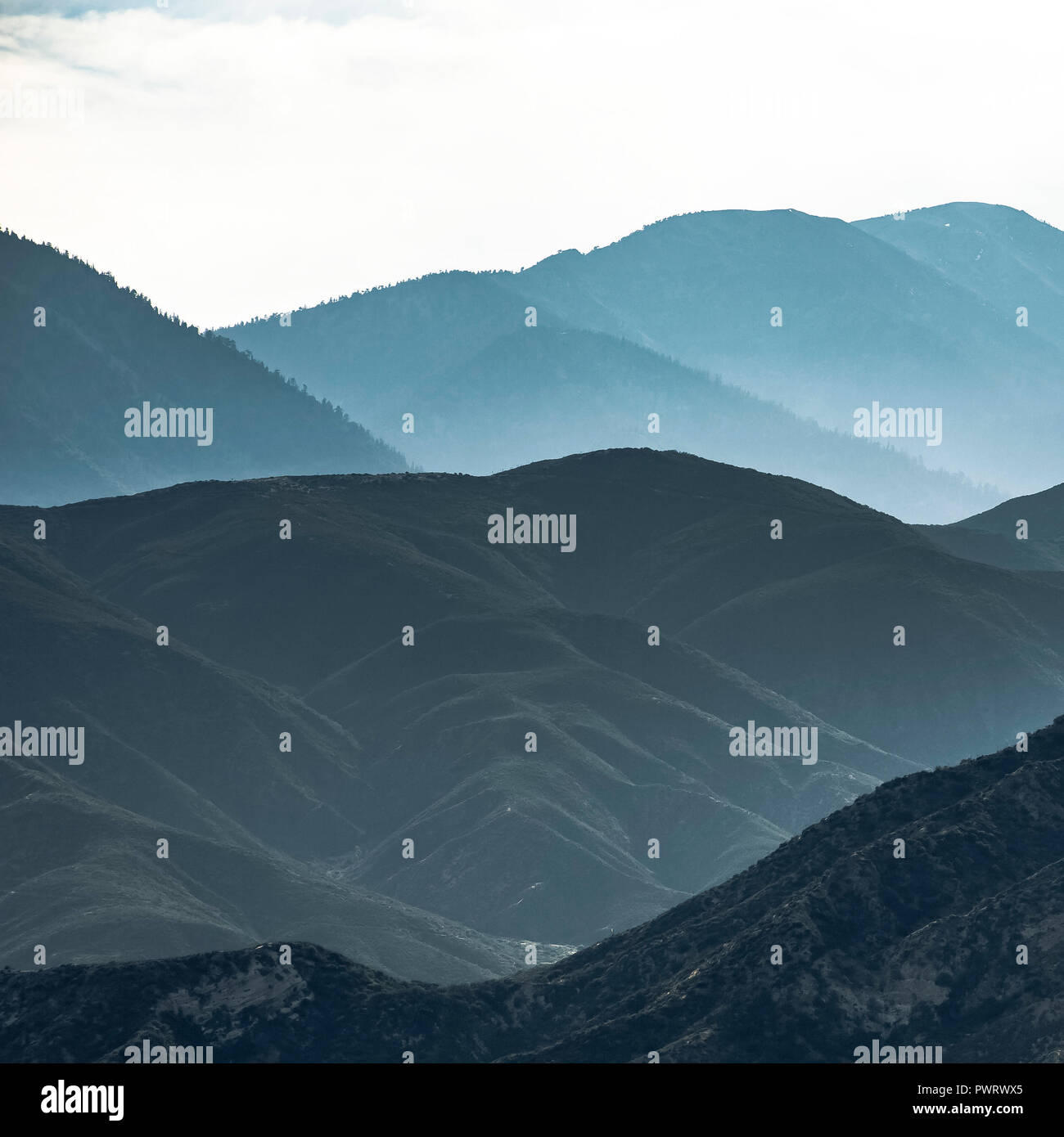 A sihouetted mountain range in Ontario California Stock Photo
