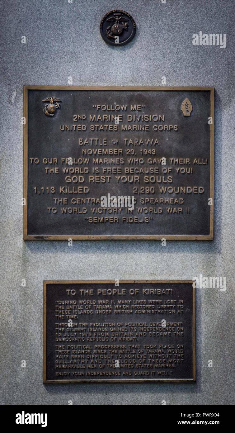 A plaque on a memorial site hangs to commemorate the Battle of Tarawa