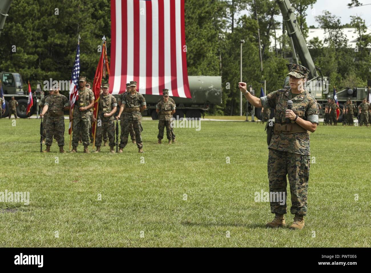 U.S. Marine Corps Lt. Col. Lauren S. Edwards speaks at the 8th Engineer  Support Battalion (ESB) change of command ceremony at Soifert Field on Camp  Lejeune, N.C., June 23, 2017. During the