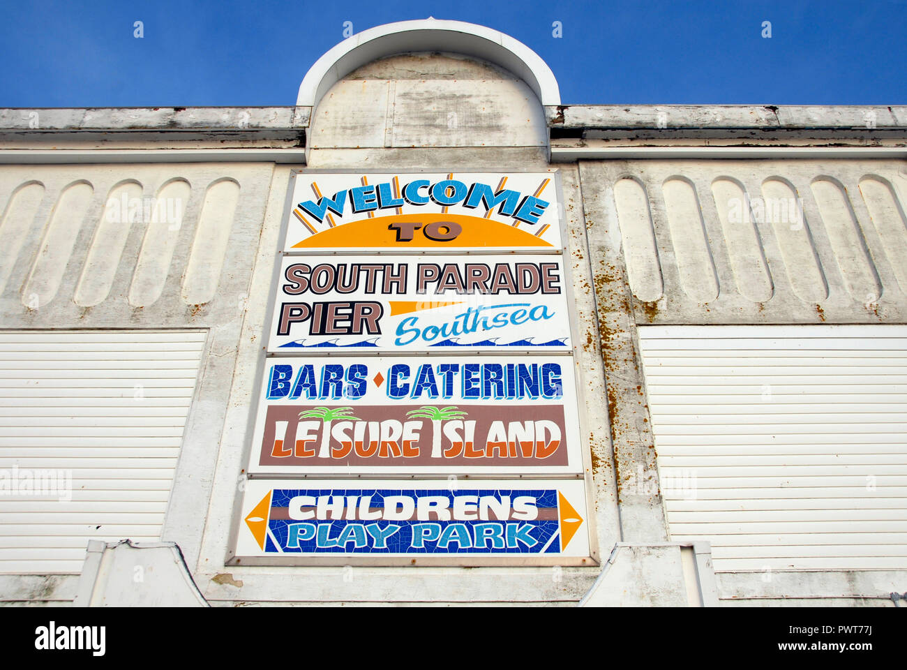 Sign on side of South Parade Pier, Southsea, Portsmouth, Hampshire, England listing some of the attractions, 2011 Stock Photo