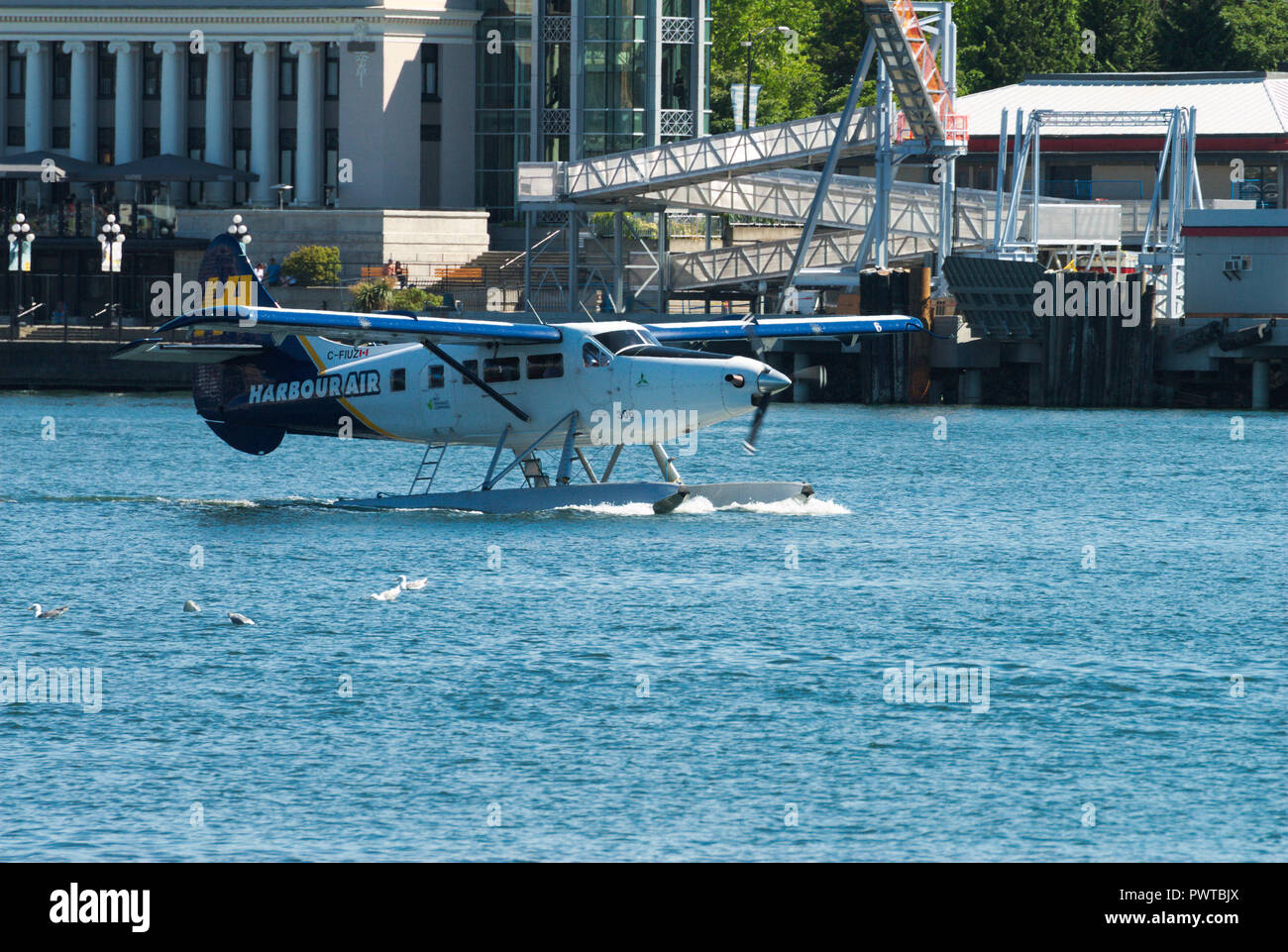 A float plane prepares for take off from the inner harbor in Victoria, British Columbia, Canada Stock Photo