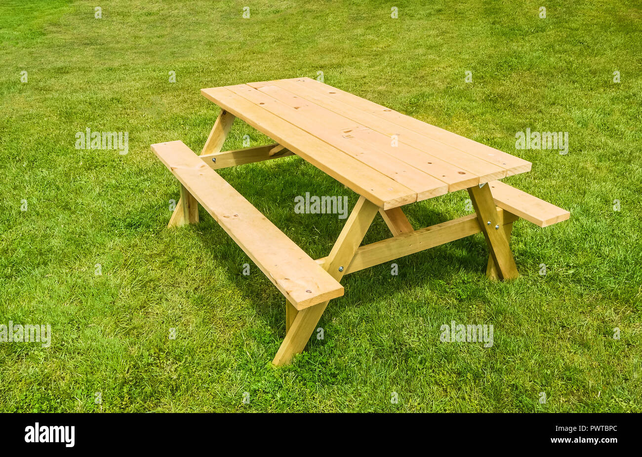 Picnic table on green lawn in a park Stock Photo Alamy