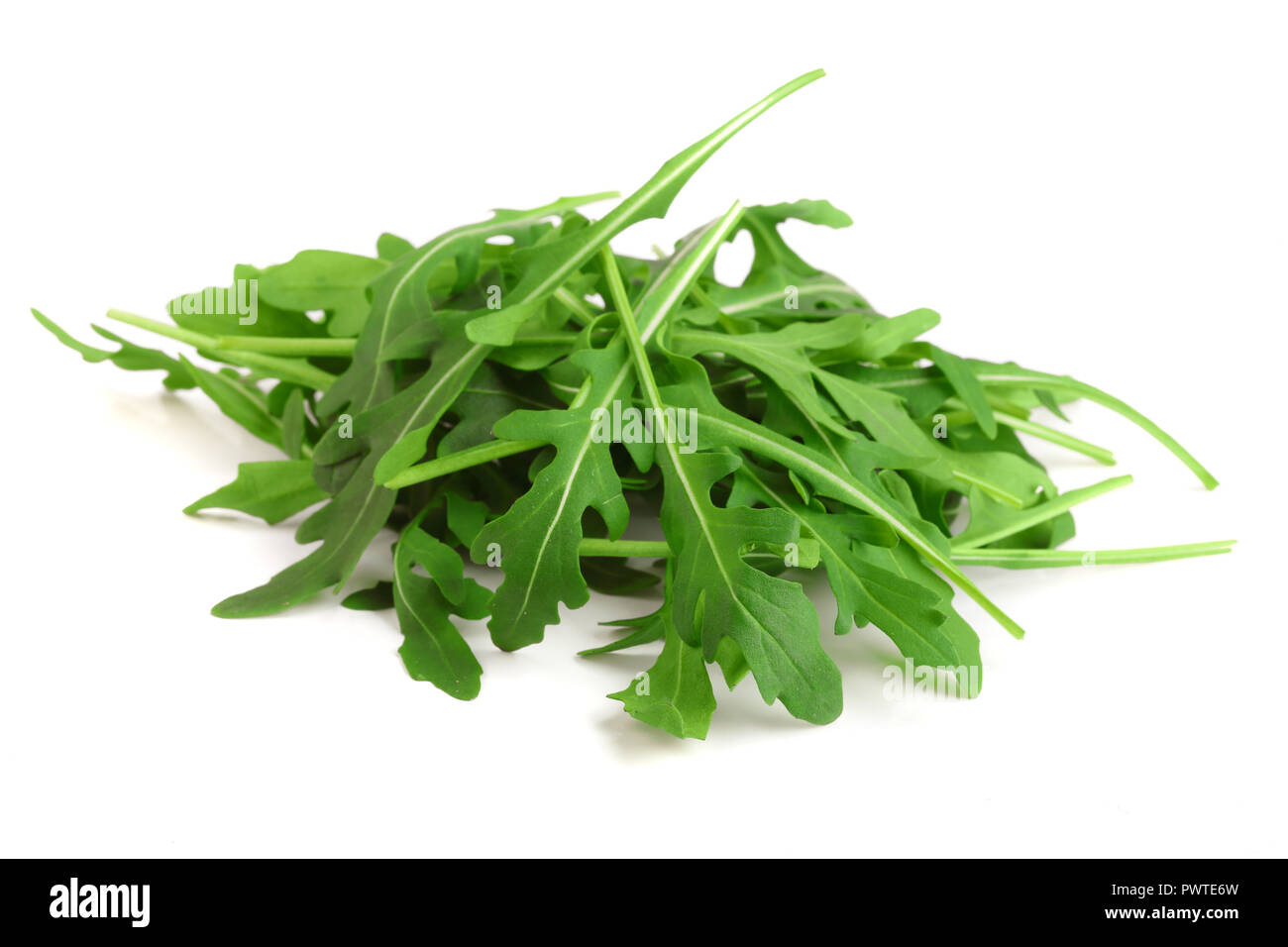 Heap of Green fresh rucola or arugula leaf isolated on white background ...