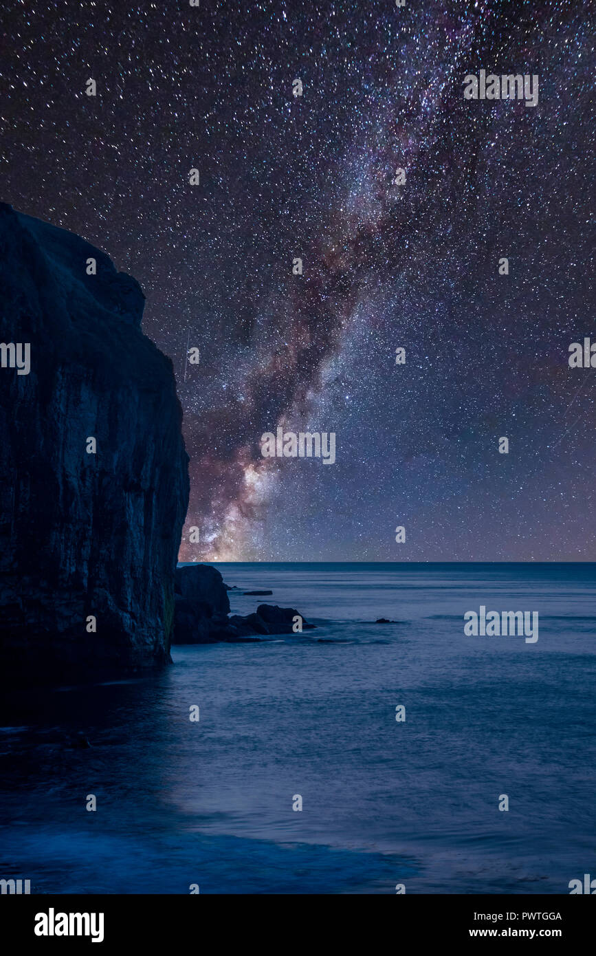 Stunning vibrant Milky Way composite image over landscape of long ...