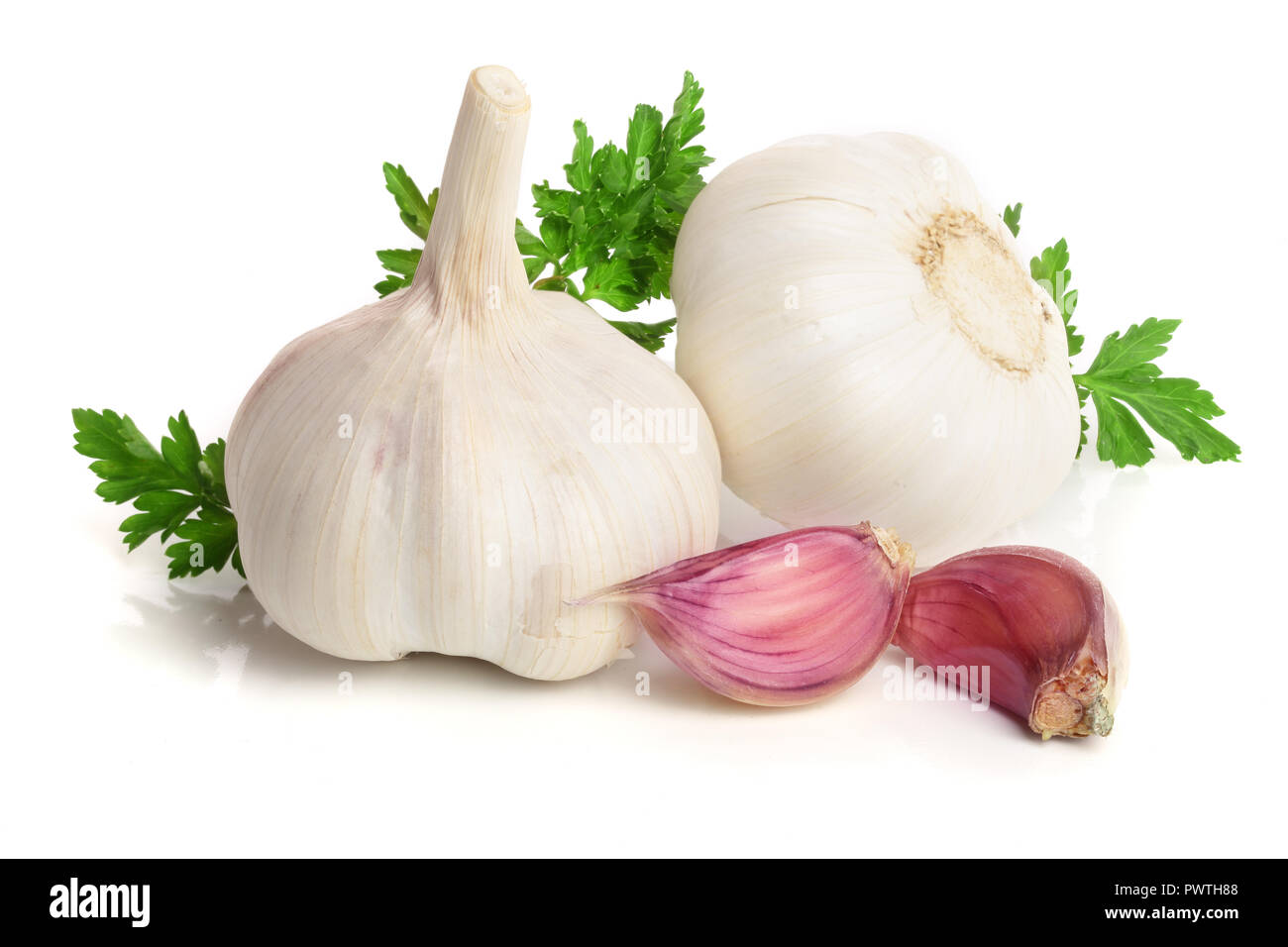garlic with parsley leaf isolated on white background Stock Photo - Alamy
