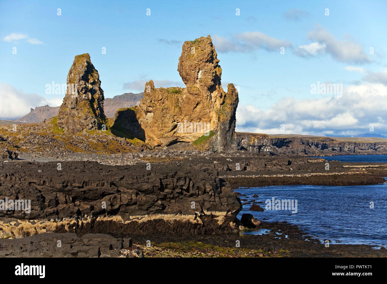 Coastal landscape with rock formation Lóndrangar, Snæfellsjökull National Park, Snæfellsnes Peninsula, West Iceland Stock Photo