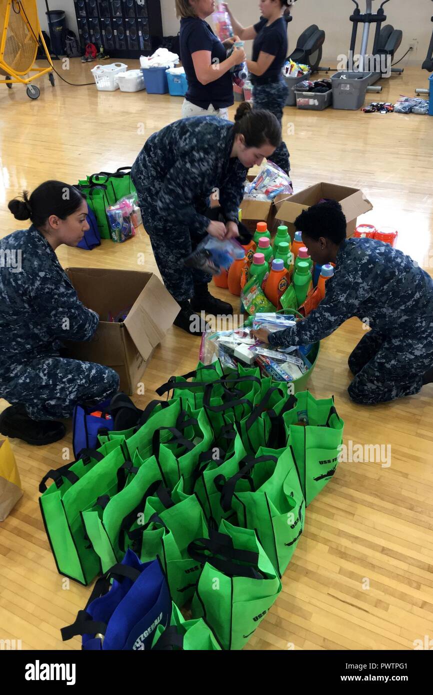 YOKOSUKA, Japan (June 19, 2017) Volunteers organize donated items at