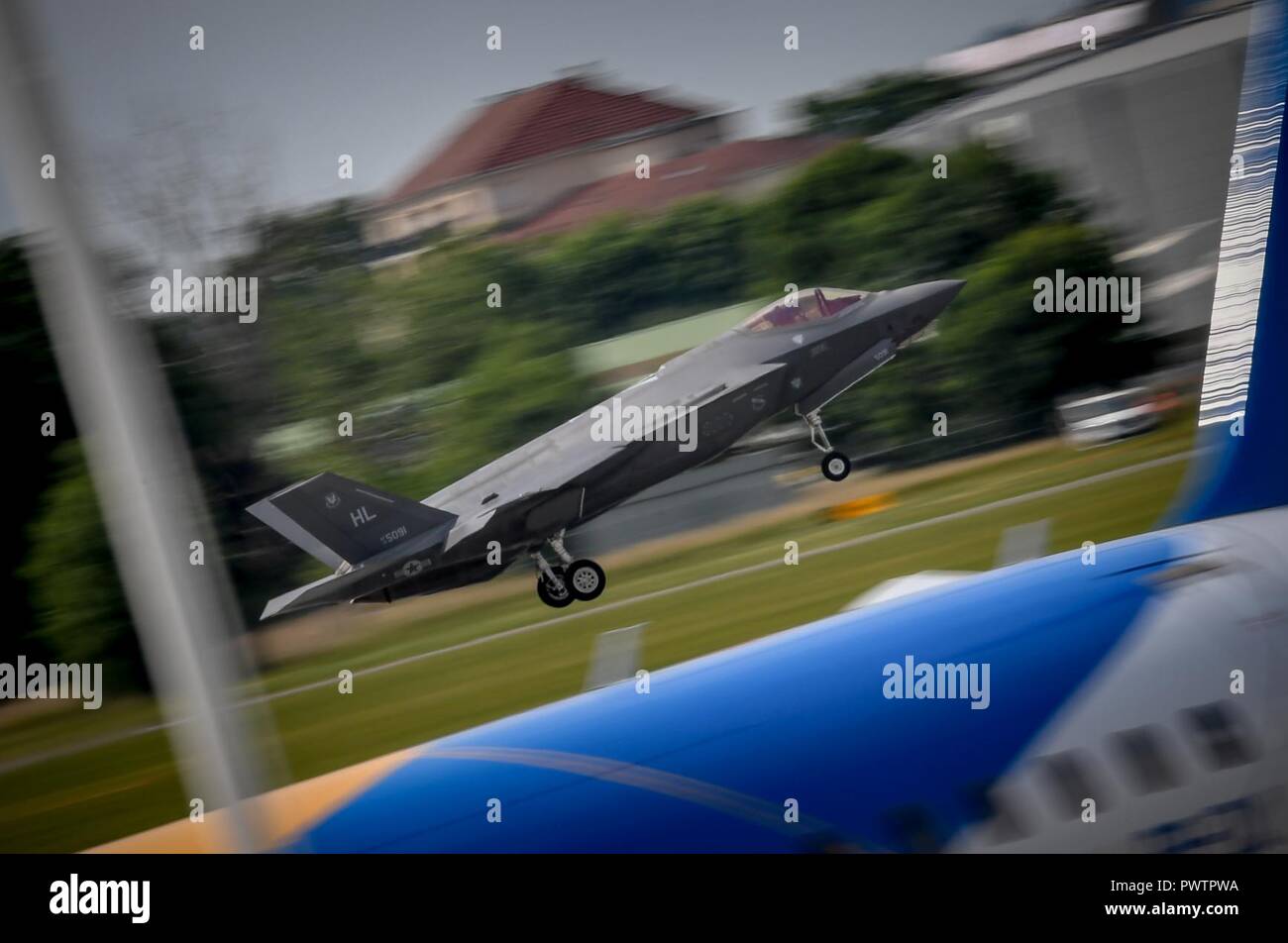 An F-35A Lightning II from Hill Air Force Base, Utah, lands after performing a flight demonstration at the Paris Air Show June 20, 2017 at Le Bourget, France. This is the first time the F-35 has performed aerial demonstrations at an international air show. Aside from the F-35, the U.S. has static displays of an F-16 Fighting Falcon, a CH-47 Chinook, an AH-64 Apache, a P-8 Poseidon, a C-130J Super Hercules and a CV-22 Osprey. The Paris Air Show offers the U.S. a unique opportunity to display their leadership in aerospeace and technology on an international scale. Stock Photo
