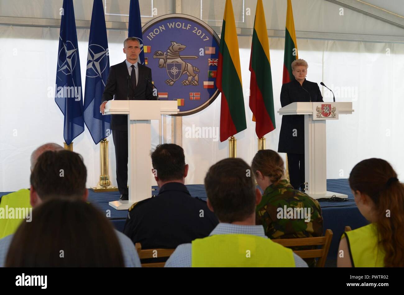 During a joint press conference with the Dalia Grybauskaite, President of the Republic of Lithuania, and Jens Stoltenberg, NATO Secretary General, the two leaders speak on the Suwalki Gap River Crossing and the development of NATO's Enhanced Forward Presence Battle Groups, June 20. The Battle Group conducts operations during Exercise Iron Wolf, a component of Saber Strike 17, to test their ability to mobilize quickly across the river, overcoming terrain. Stock Photo