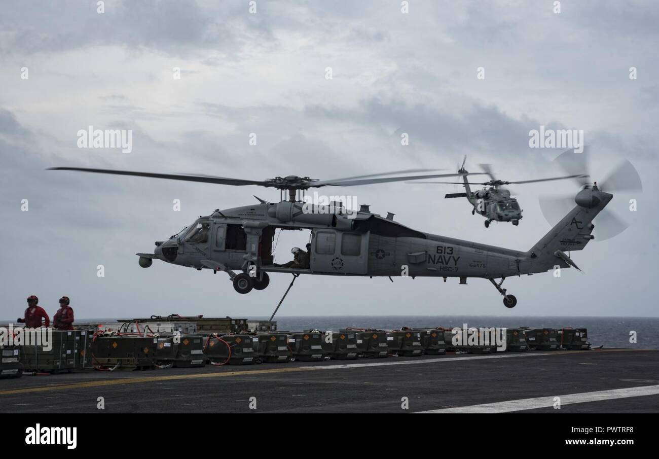 ATLANTIC OCEAN (June 20, 2017) MH-60S Sea Hawks assigned to the Dusty ...