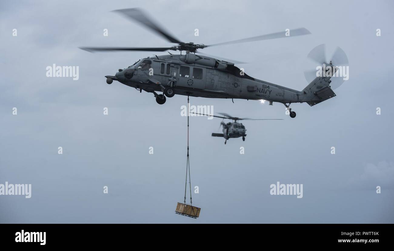 ATLANTIC OCEAN (June 21, 2017) An MH-60S Sea Hawk assigned to the Dusty ...