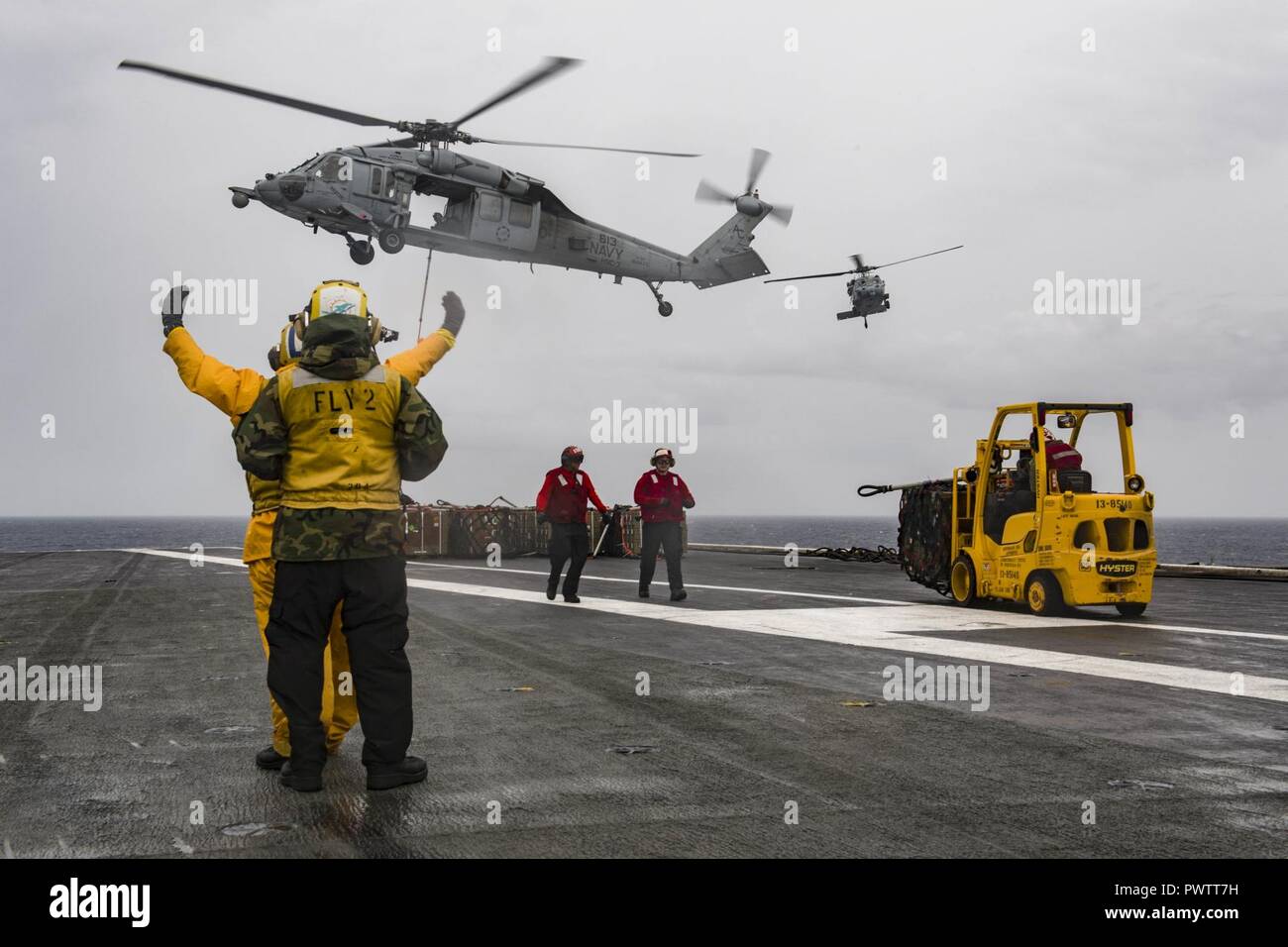 ATLANTIC OCEAN (June 21, 2017) Sailors direct an MH-60S Sea Hawk ...