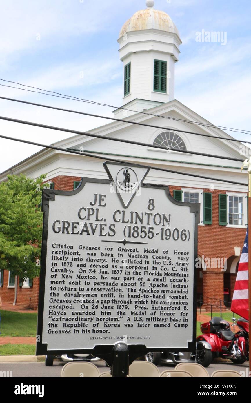 A new historical marker honoring U.S. Army Cpl. Clinton Greaves and his act of “extraordinary heroism” during a U.S. cavalry fight with Apache Indians is unveiled June 24, 2017, in Madison, Virginia. Stock Photo