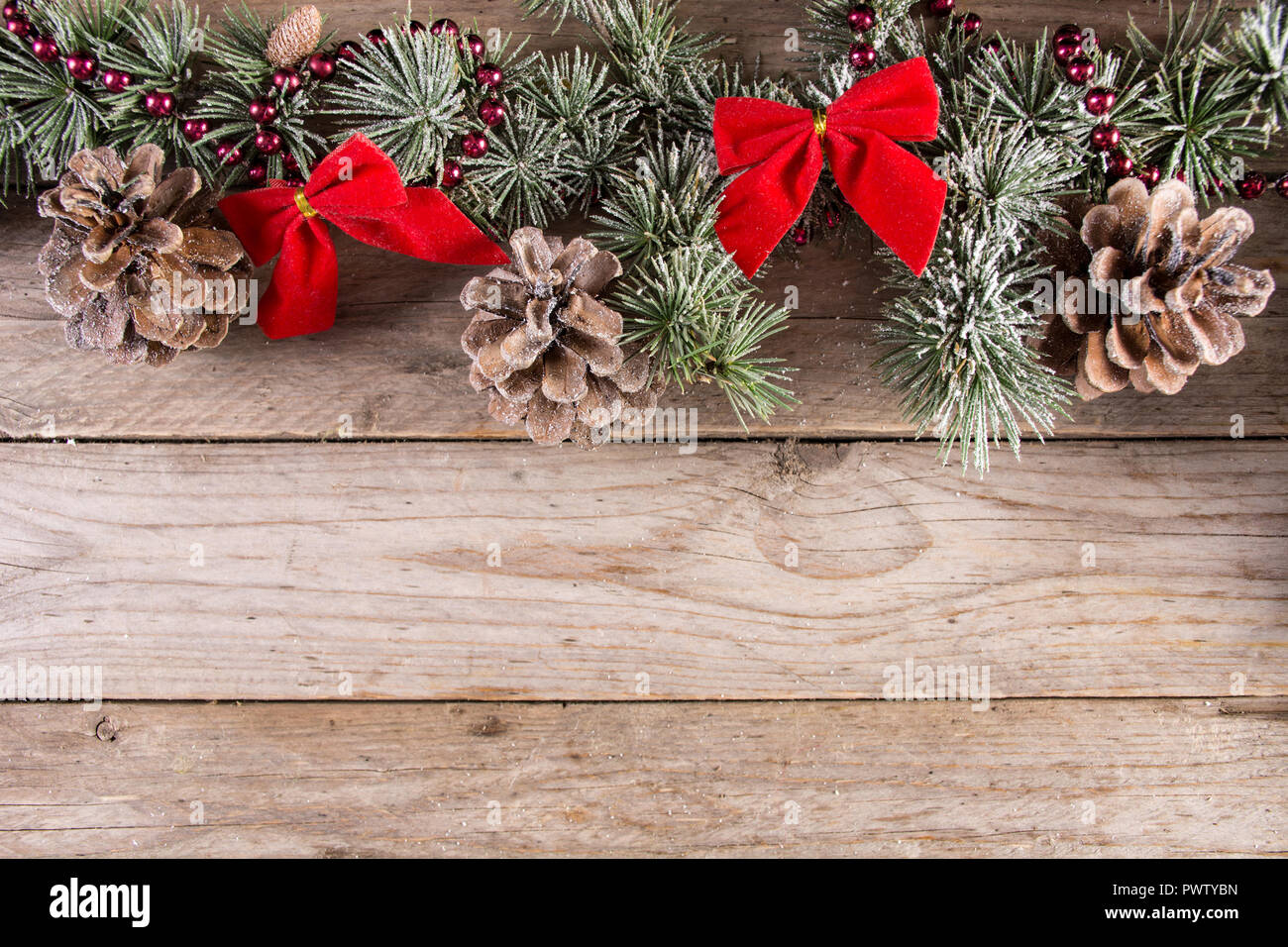 Christmas and New year holiday background with fir tree and pine cone ...