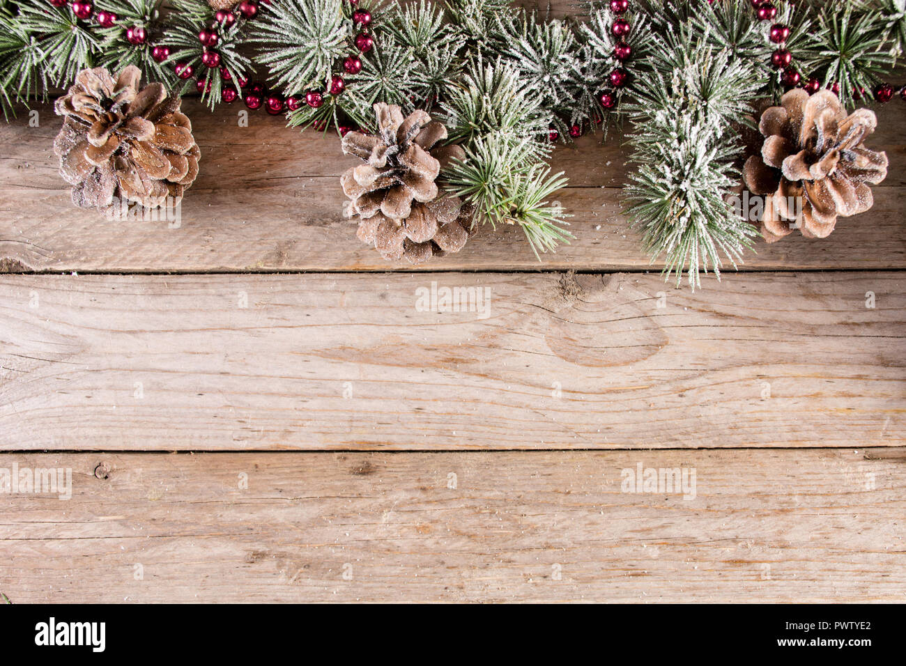 Christmas and New year holiday background with fir tree and pine cone ...