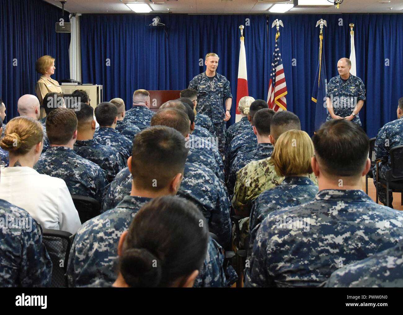 YOKOSUKA, Japan (June 19, 2017) – Vice Adm. Joseph Aucoin (center),  commander of U.S. 7th Fleet, and Rear. Adm. Greg Fenton (right), commander  of Naval Forces Japan/Navy Region Japan and Commanding Officer,